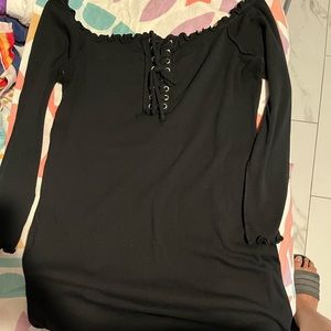 Black short dress, off the shourlder, same ruffles on the top are on the bottom